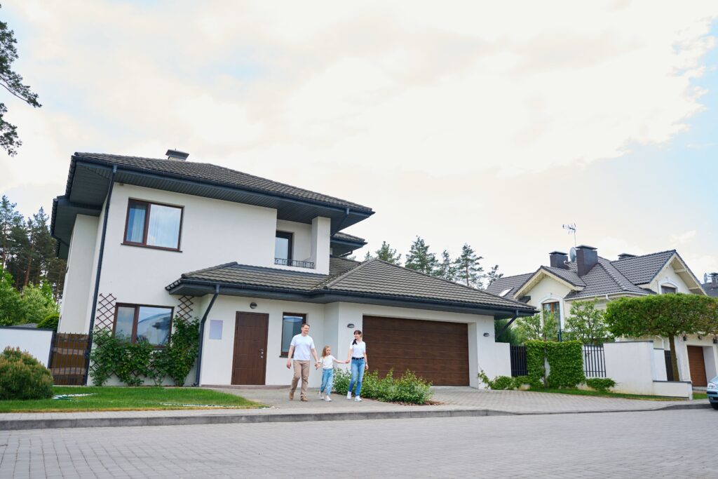 family-going-from-new-modern-townhouse-outdoors-in-2024-10-22-04-51-42-utc (1)