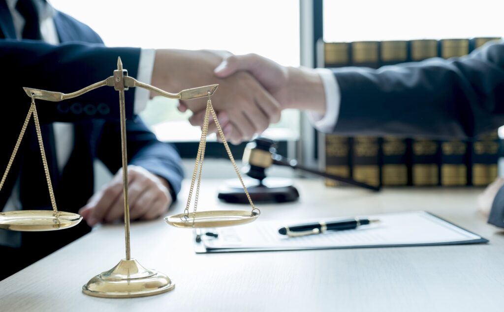 handshake-after-lawyer-providing-legal-consult-bus-2025-02-12-01-37-23-utc (1)